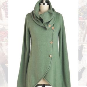 Whimsical pale green sweater